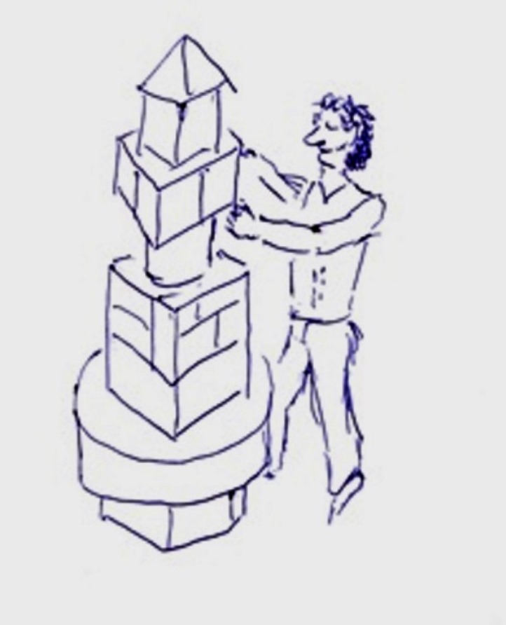 Ein Junge baut einen Turm aus Bauklötzen